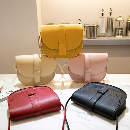 Rounded flap crossbody bag – Five colours arranged on display | BTendance