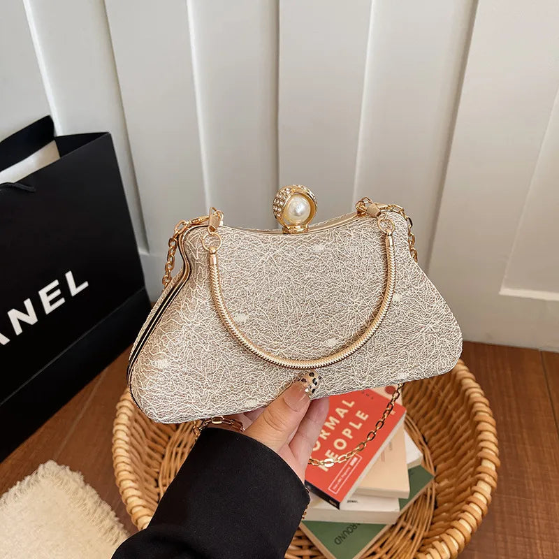 Women's Textured Evening Bag with Pearl-Effect Clasp – Gold held for scale | BTendance