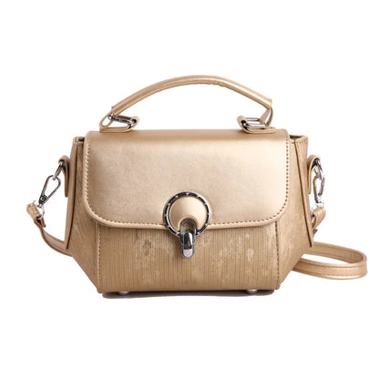 Ring clasp top handle crossbody bag – Gold bag with shoulder strap, front view | BTendance