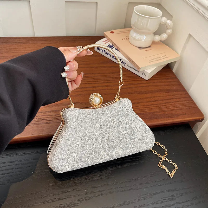 Women's Textured Evening Bag with Pearl-Effect Clasp – Silver carried by handle | BTendance