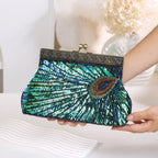 Women's Peacock Beaded Evening Clutch with Kiss Clasp – Front held for scale | BTendance
