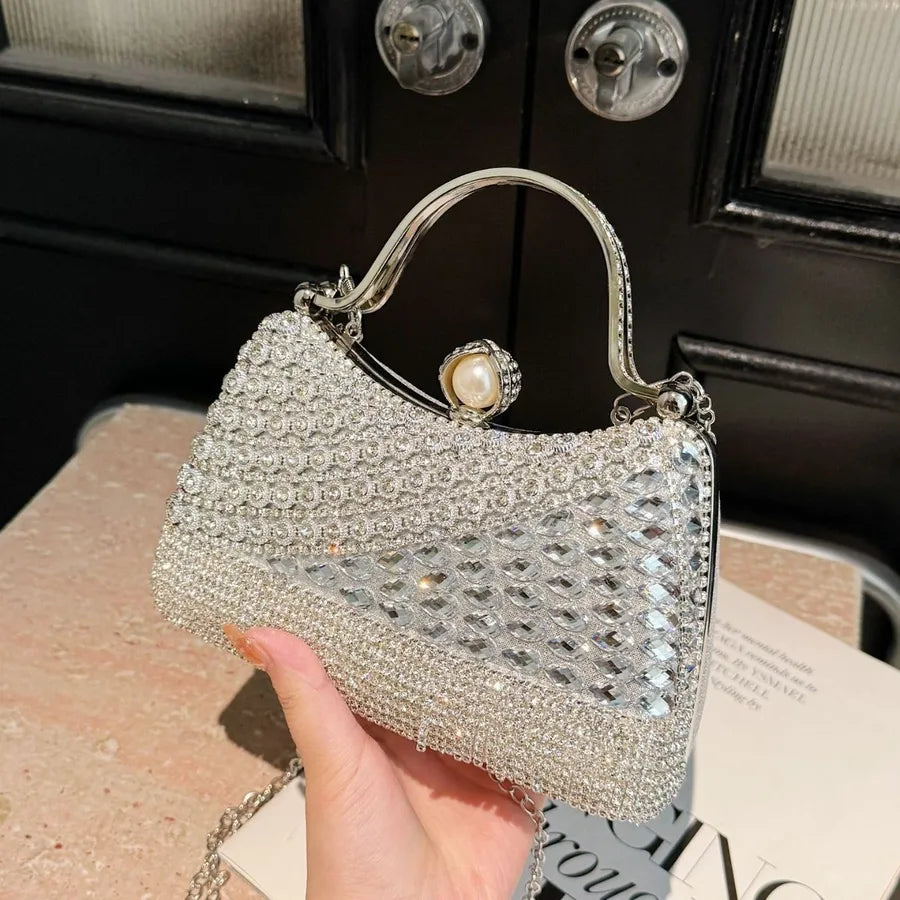 Women's Diagonal Rhinestone Top Handle Evening Bag – Silver held for scale | BTendance