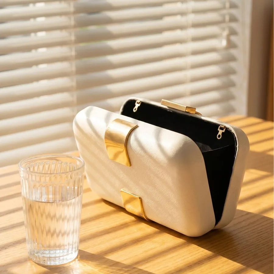 Rectangular evening clutch — ivory open view showing dark interior | BTendance