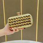 Women's Faceted Rhinestone Evening Clutch with Chain – Gold held for scale | BTendance
