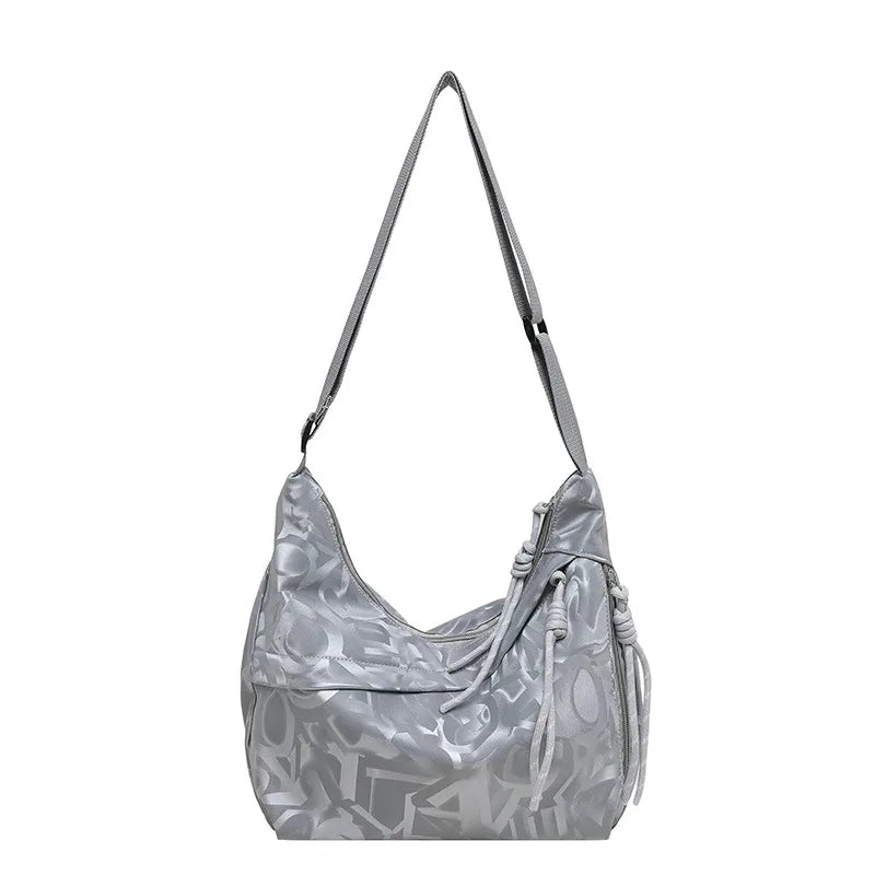 Patterned shoulder bag with braided front detail — silver on white background | BTendance