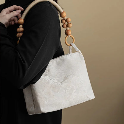 Floral shoulder bag with beaded handle – Cream bag worn on the shoulder | BTendance