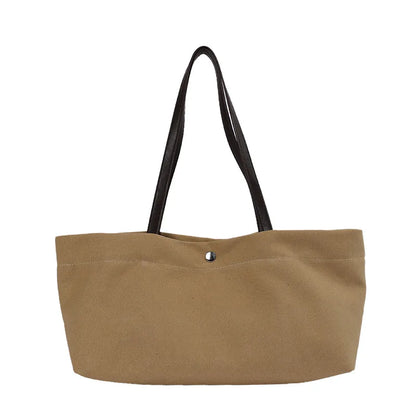 Wide canvas tote with contrasting dark shoulder handles — tan front view on white background | BTendance
