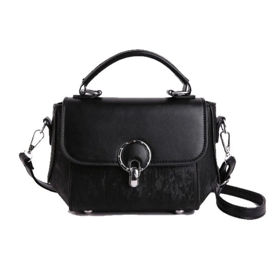 Ring clasp top handle crossbody bag – Black bag on white background | BTendance