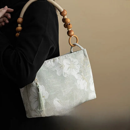 Floral shoulder bag with beaded handle – Pale green floral bag worn on shoulder | BTendance