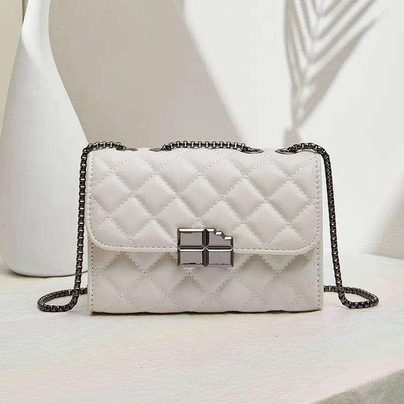 Quilted chain strap crossbody bag – White bag, front view on table | BTendance