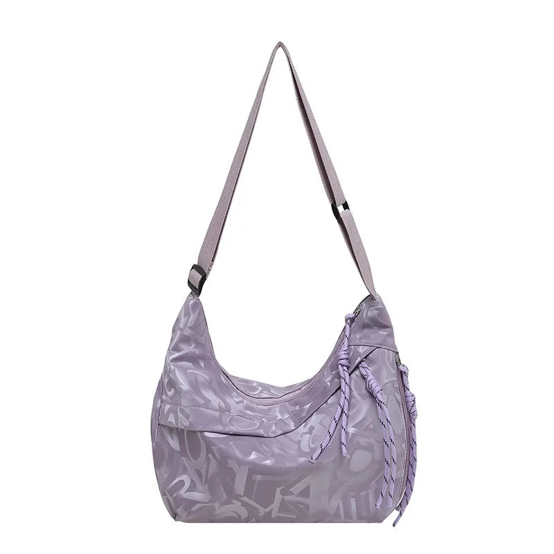 Patterned shoulder bag with braided front detail — lilac on white background | BTendance