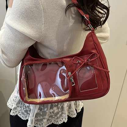Shoulder bag with clear front display pocket — burgundy worn on shoulder with empty clear pocket | BTendance