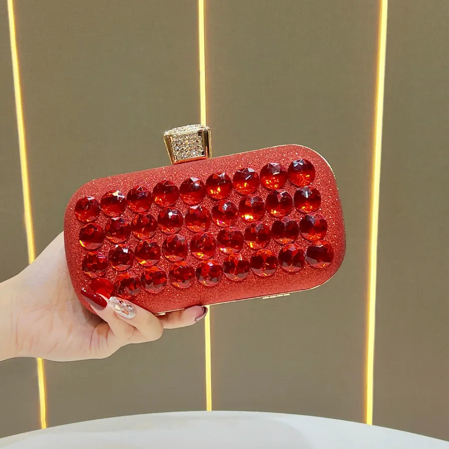 Women's Faceted Rhinestone Evening Clutch with Chain – Red held for scale | BTendance