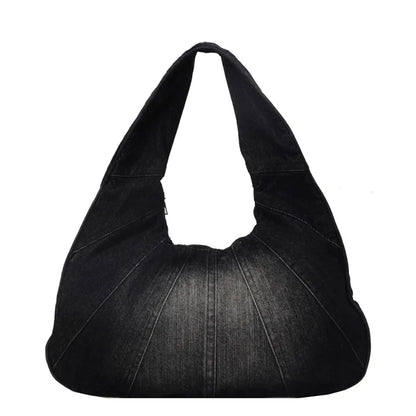 Denim shoulder bag with panel seams – Black bag on white background | BTendance