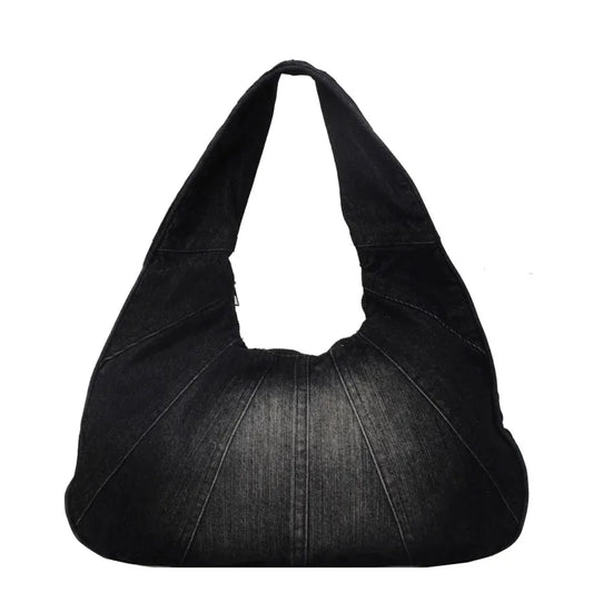 Denim shoulder bag with panel seams – Black bag on white background | BTendance