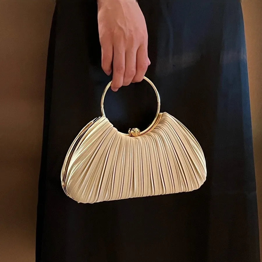Women's Pleated Polyester Ring Handle Evening Clutch – Apricot carried by handle | BTendance