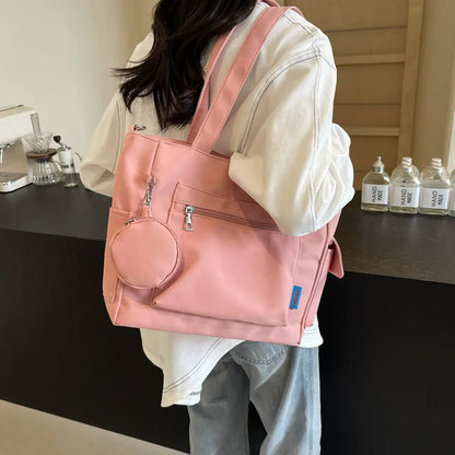 Pocket tote bag with round pouch – Pink bag worn on the shoulder | BTendance