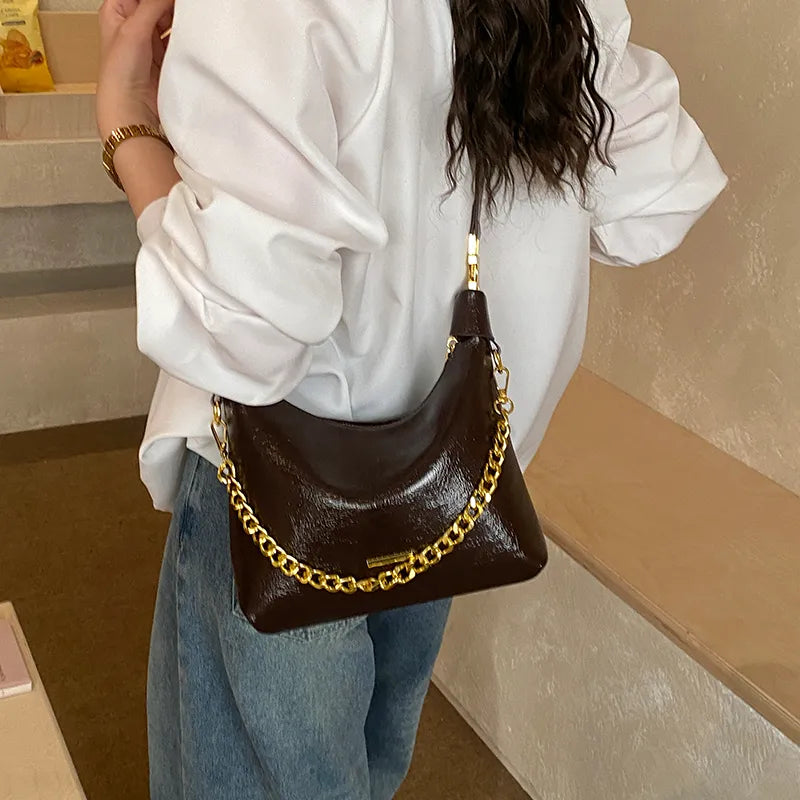 Soft handbag with gold tone chain – Brown bag worn on the shoulder | BTendance
