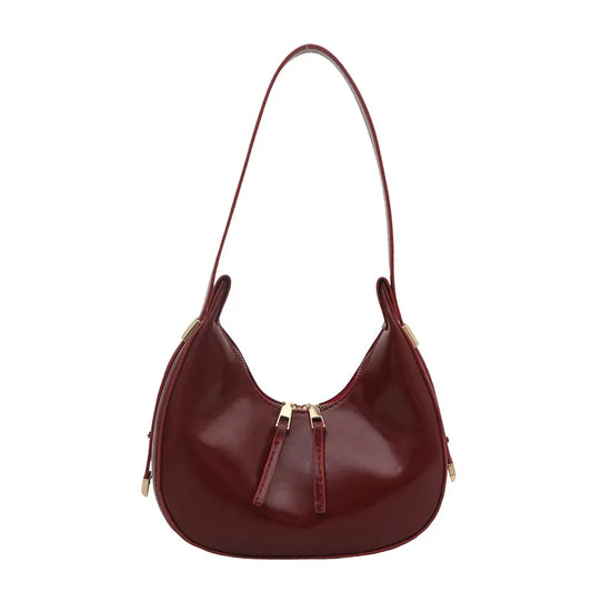 Curved zip shoulder bag – Burgundy bag on white background | BTendance