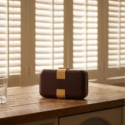 Rectangular evening clutch — brown front view on wooden cabinet | BTendance