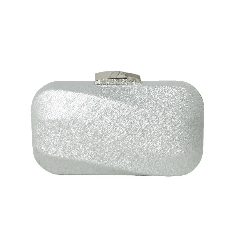 Rounded rectangular evening clutch with metal clasp — silver front view on white background | BTendance