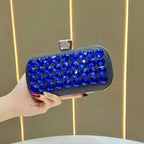 Women's Faceted Rhinestone Evening Clutch with Chain – Blue held for scale | BTendance