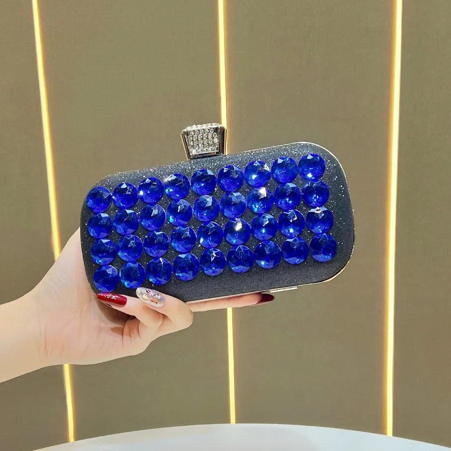 Women's Faceted Rhinestone Evening Clutch with Chain – Blue held for scale | BTendance