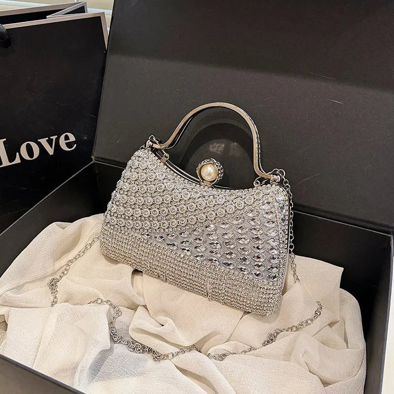 Women's Diagonal Rhinestone Top Handle Evening Bag – Silver held for scale | BTendance