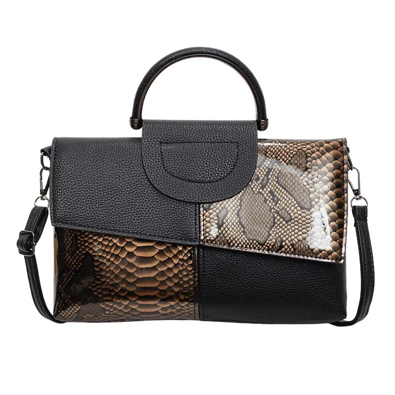 Structured handbag with contrasting reptile-texture panels — black and brown on white background | BTendance