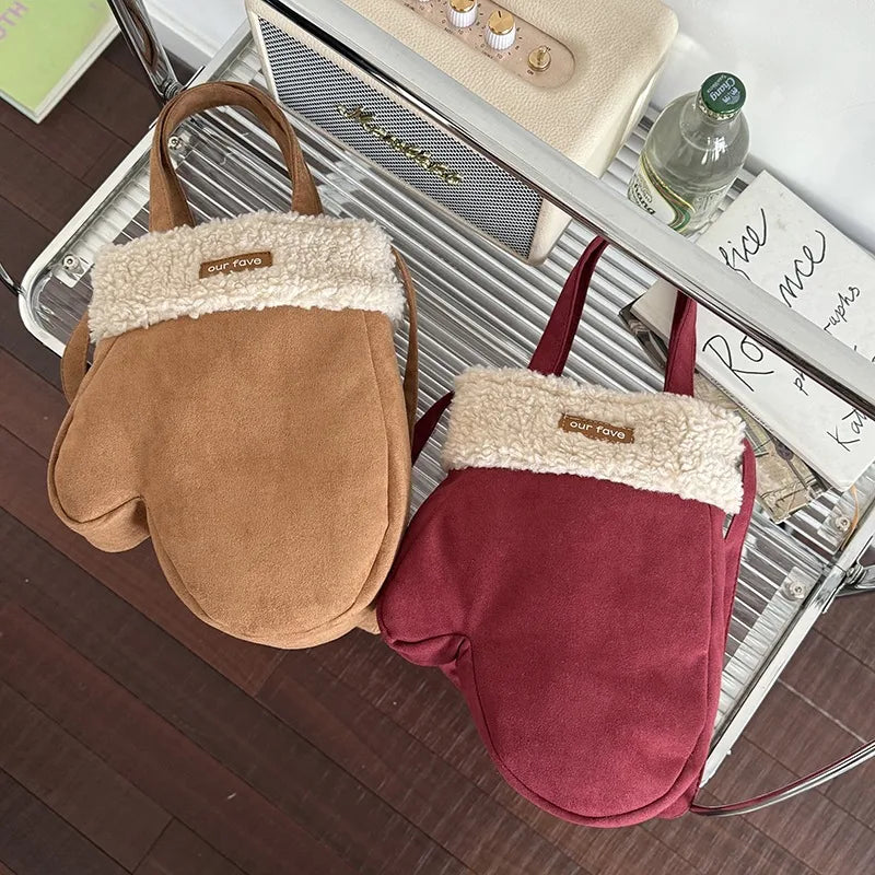 Mitten-shaped crossbody bag with contrasting plush panel — tan and burgundy hanging together | BTendance