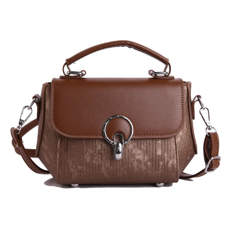 Ring clasp top handle crossbody bag – Brown bag with shoulder strap, front view | BTendance
