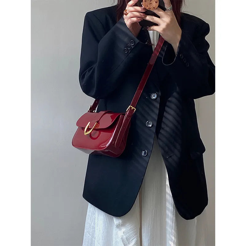 Flap shoulder bag with gold tone U clasp – Red bag worn across the body | BTendance