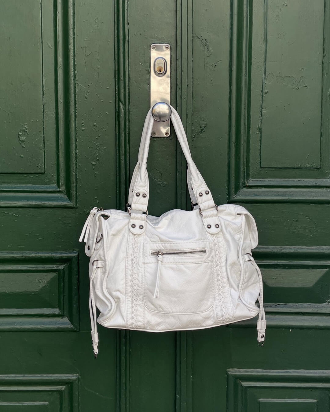 Vegan Leather Shoulder Bag – Arabell Braided Detail — White, hanging from handle | BTendance
