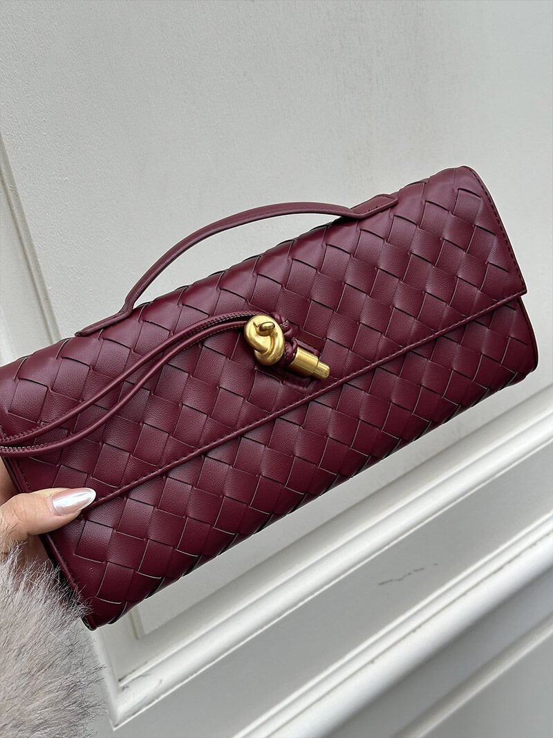 Woven Vegan Leather Baguette Bag – Bianca Gold-Tone Toggle — Wine Red, hand-held close-up | BTendance