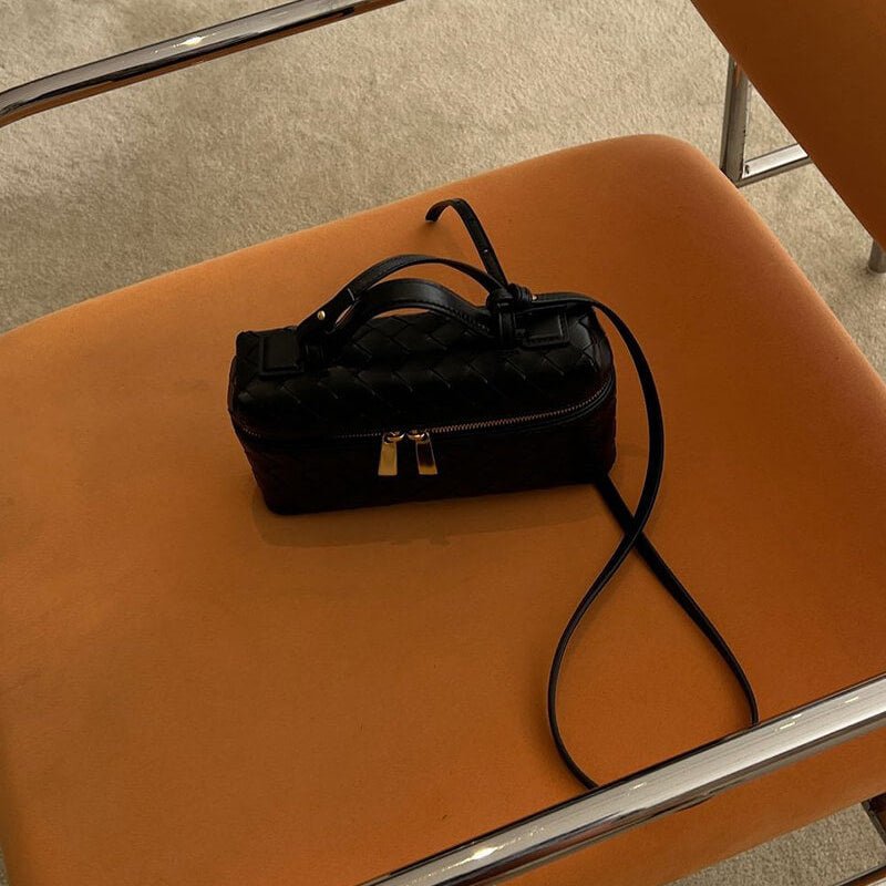 Woven Vegan Leather Mini Bag – Tara Top Handle — Black, tabletop view with strap | BTendance